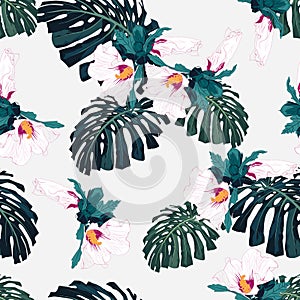 Seamless pattern with palm monstera leaves and tropical hibiscus flowers.