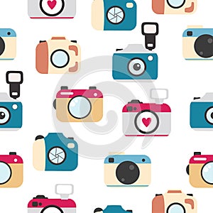 Seamless pattern with photocameras flat icons.