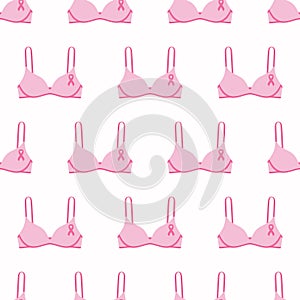 Seamless pattern with pink cancer ribbons on bras. Breast Cancer Awareness Month pink and white background. Cancer ribbon symbol.