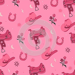Seamless pattern in pink colors with cowboy hats, saddles and horseshoes. Vector graphics