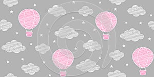 Seamless pattern with pink hot air balloons, white clouds and small stars on a gray background