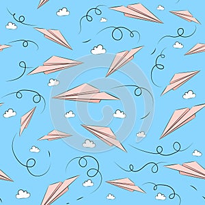 Seamless pattern with pink paper airplanes and clouds