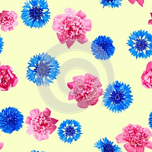 Seamless pattern of pink peony and blue cornflower flowers on yellow background