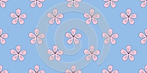 Seamless pattern with pink sakura or cherry blossom flowers head on blue, doodle style vector