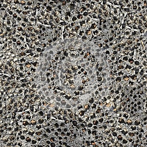 Seamless pattern of porous cement wall texture, rough concrete background