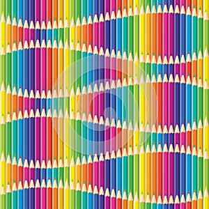 Seamless pattern. Print of bright colored pencils arranged in a wave. Can use in textile or decorative design of paper. Rainbow