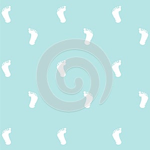 Seamless pattern, prints of foots of the child photo