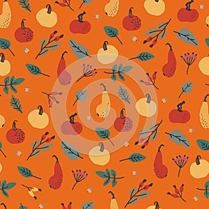 Seamless pattern with pumpkins, berries and leaves on orange background. Thanksgiving Day concept