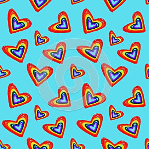 Seamless pattern with rainbow Hearts colored in LGBT flag colors. Gay pride symbol. LGBT community symbol