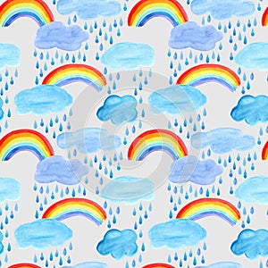 Seamless pattern of a rainbow,rain drops and clouds.