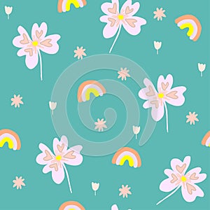 seamless pattern with rainbows and abstract flower,childish print for wallpaper,cover design,kids fabric,nursery