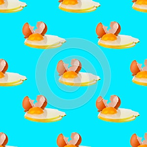Seamless pattern of raw eggs with yellow yolk on blue background isolated, broken brown eggshell repeating ornament, Easter banner