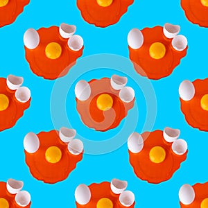 Seamless pattern raw orange eggs, yellow yolk, white eggshell on blue background isolated, repeat ornament backdrop, Easter banner