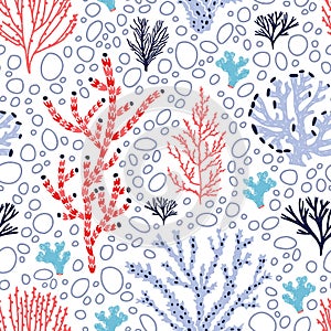 Seamless pattern with red and blue corals and seaweed on white background. Backdrop with tropical aquatic species, sea