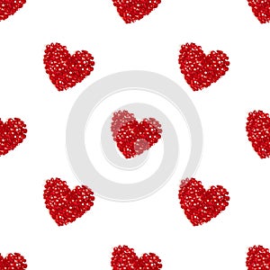 Seamless pattern with red hearts on a white background. Shiny hearts made of beads. Valentines day concept