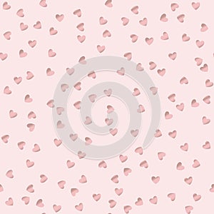 Seamless pattern with rose gold confetti hearts.