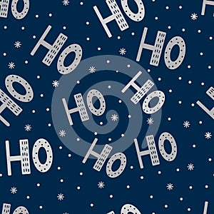 Seamless pattern of scandinavian lettering hohoho. Silver letter and snow on dark background. Abstract wallpaper and wrapping