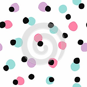 Seamless pattern with scattered round spots. Drawn with a watercolor brush.