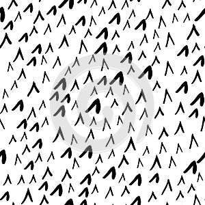 Seamless pattern with sharp corner abstract form in black and white. Hand drawn triangle objects in chaotic composition