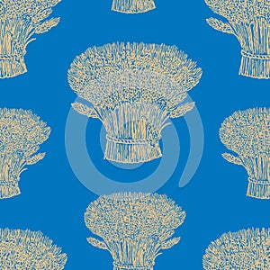 Seamless pattern of the sheafs of ripe wheat