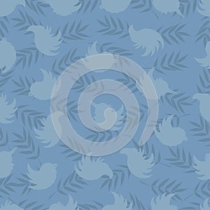 Seamless pattern of silhouettes of birds and rowan leaves in soft blue tones
