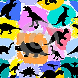 Seamless pattern with silhouettes of dinosaurs and watercolor colorful spots. Preistoric animals. Vector background.