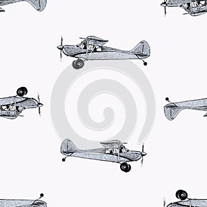 Seamless pattern of sketches retro airplanes in flight