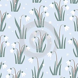 Seamless pattern with Snowdrops flower and snowflakes on light blue background. Vector Illustration.