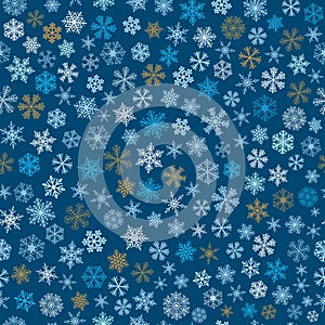 Seamless pattern of snowflakes, light blue, brown and white on blue