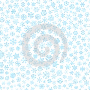 Seamless pattern of snowflakes, light blue on white