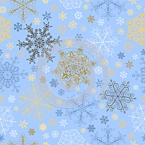 Seamless pattern of snowflakes, multicolored on light blue