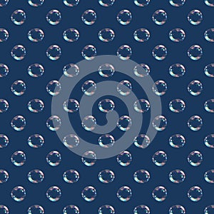 Seamless pattern of soap bubbles isolated on a blue background.