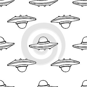 Seamless pattern of space transport with a black outline on a white background. a flying saucer of space aliens. A vector
