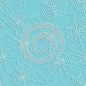 Seamless pattern with spider web on sky blue background