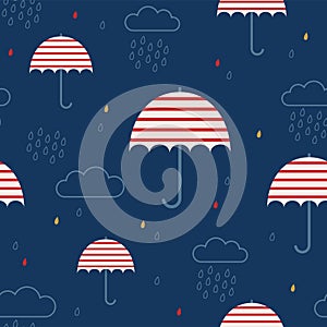 Seamless pattern of striped umbrellas and clouds. Rainy background