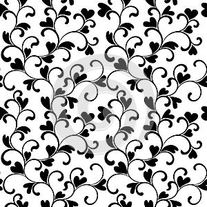 Seamless pattern with swirls and hearts on a white background