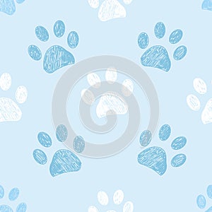 Seamless pattern for textile design. Blue and white colored paw print pattern