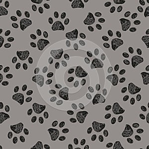 Seamless pattern for textile design. Doodle black paw print with grey background