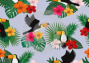 Seamless pattern of tropical floral with leaves and toucan bird on nature background