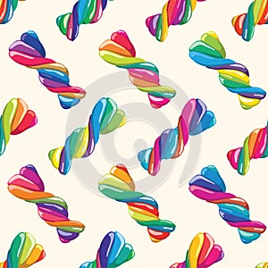 Seamless pattern of twisted lollies. vector