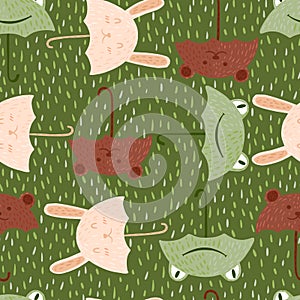 Seamless pattern umbrellas animals on green background with dashes. Funny cartoon characters bunny, frog and bear