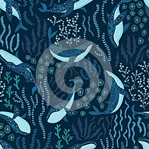 Seamless pattern with underwater humpback whales dancing under the sea on dark blue background. Vector illustration with whales in