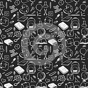 Seamless pattern with various elements for school drawn in chalk on black background