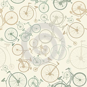 Seamless pattern with vintage bicycles on green background. Vector illustration.