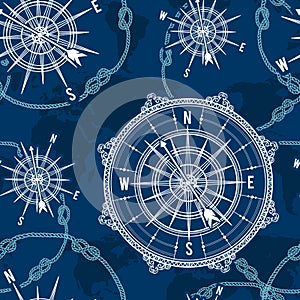 Seamless pattern with vintage compass, world map, wind rose and rope knot. Nautical background. photo