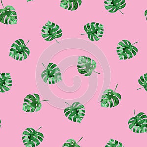 Seamless pattern with watercolor monstera leaves. Beautiful modern tropical texture. Green leaves on pink background