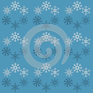 seamless pattern with white and blue snowflakes