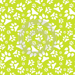 Seamless pattern with white dog footprint and claws isolated on green background.