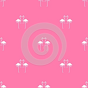 Seamless pattern with white flamingo on pink background. Decorative wallpaper, good for printing and fabric