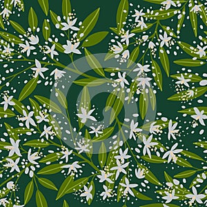 Seamless pattern of white flowers and green leaves on a dark background. Design for textile, wallpaper, paper.